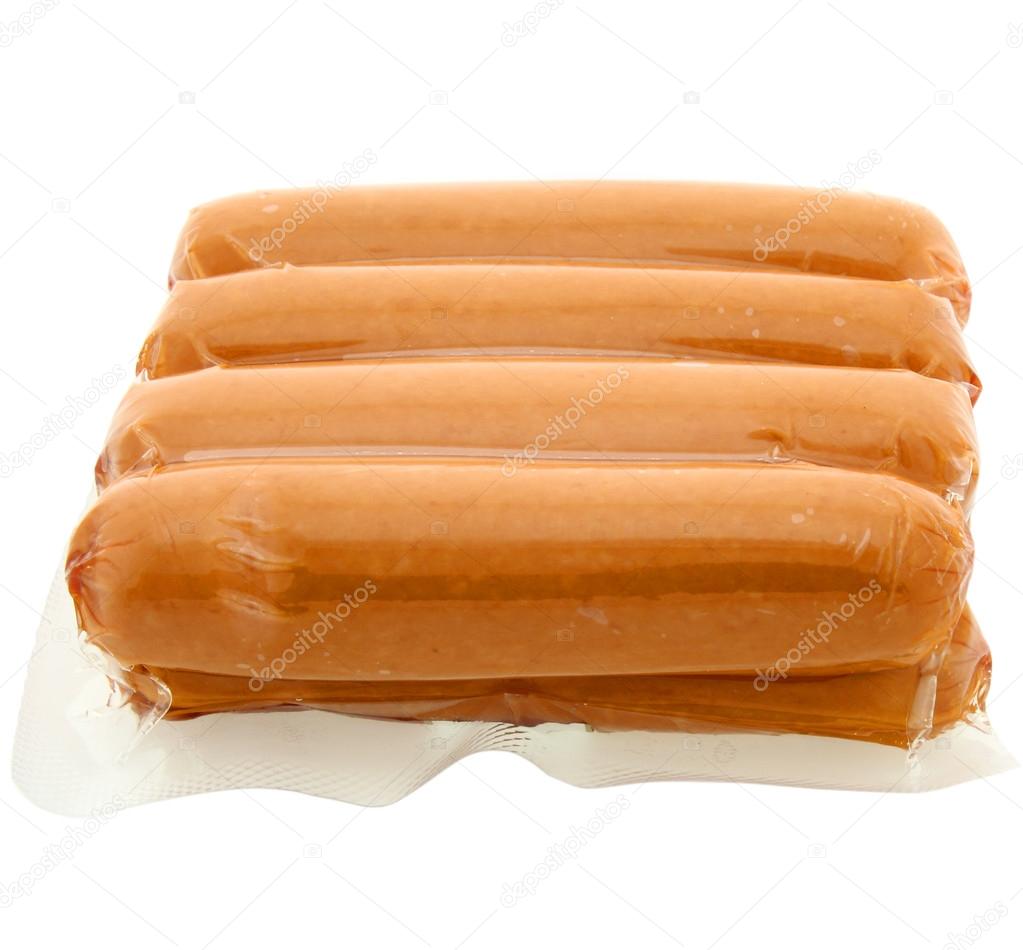 pack of raw hot dogs on a white background