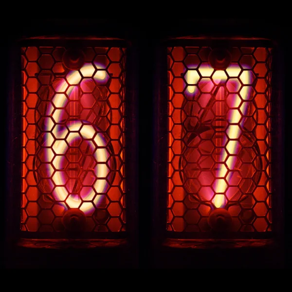 O indicador de tubo Nixie dos números de estilo retro. Dígito 6,7 — Fotografia de Stock