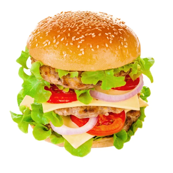 Großer Hamburger auf weißem Hintergrund lizenzfreie Stockfotos