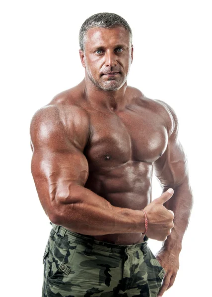 Bodybuilder posiert — Stockfoto