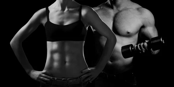 Bodybuilding. Mann und Frau lizenzfreie Stockbilder