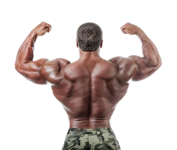 Bodybuilder poserar — Stockfoto