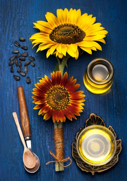 Sunflower oil and sunflower flowers