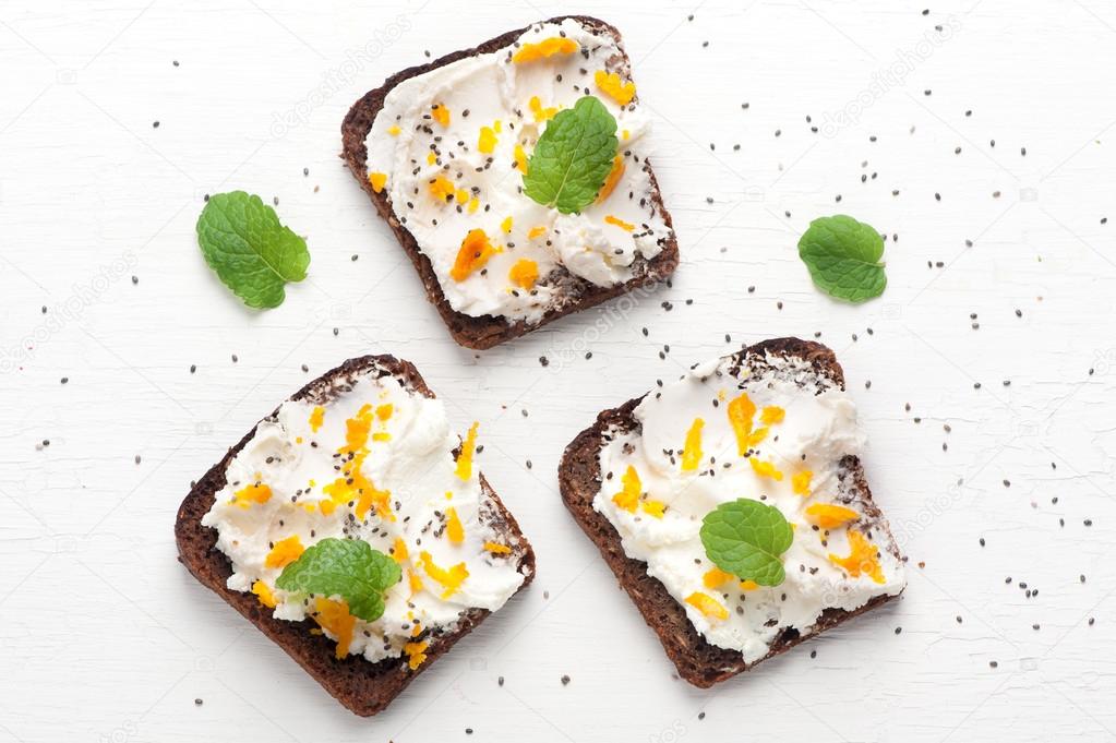 Bruschetta with goat cheese, honey and chia seeds. top view Stock Photo