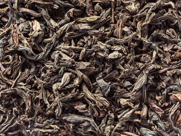 Hojas secas de té negro de cerca —  Fotos de Stock