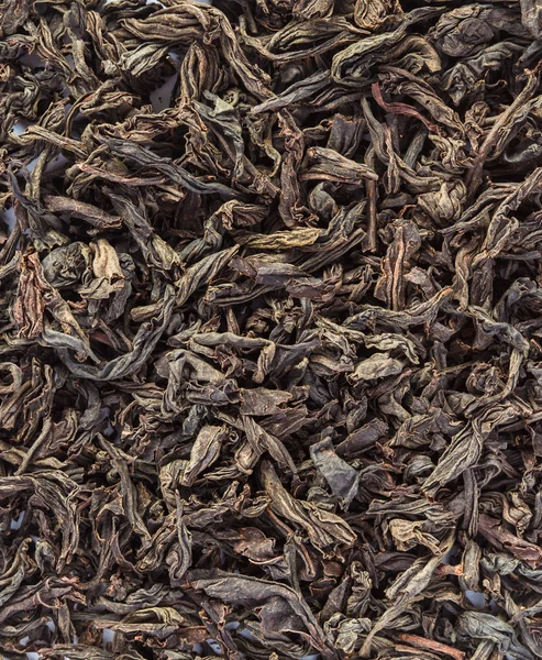 Hojas secas de té negro de cerca —  Fotos de Stock