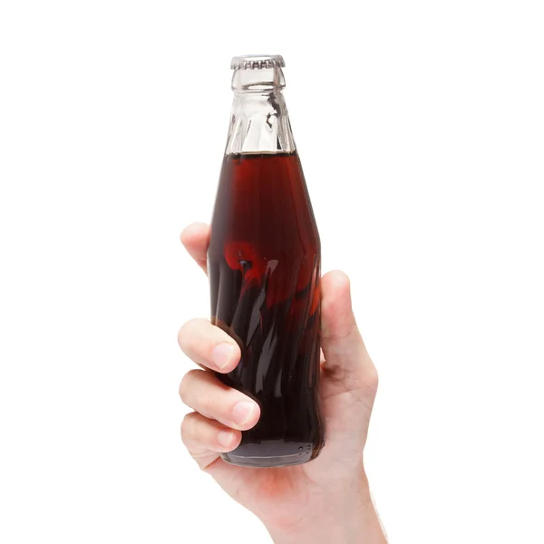 Botella de agua de soda en mano aislada sobre fondo blanco — Foto de Stock