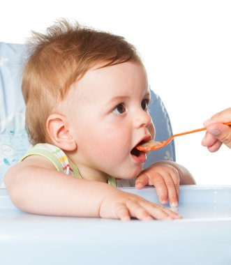 mutlu bebek çocuk çocuk yemek için bekliyor