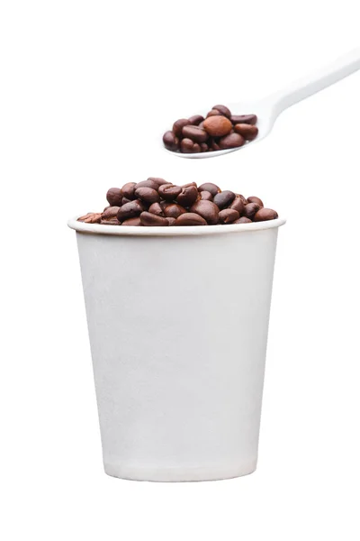 Cardboard disposable cup with coffee and spoon on white background — Stock Photo, Image