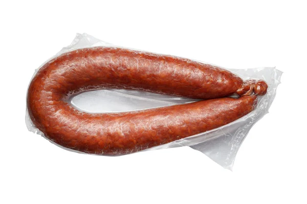 Saucisses dans un emballage sous vide isolé sur fond blanc — Photo