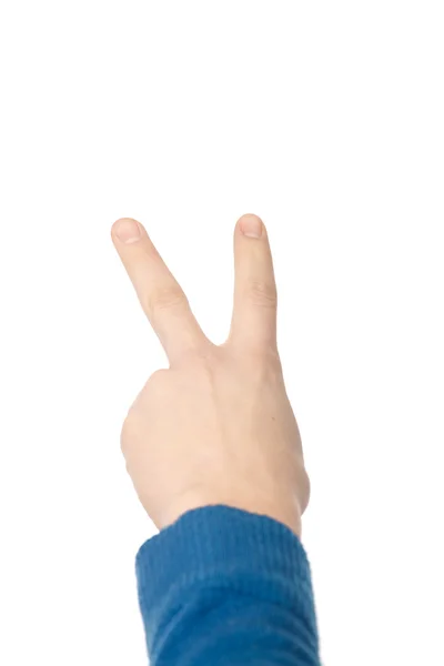 Uomo in camicia blu gesto con le mani su sfondo bianco — Foto Stock