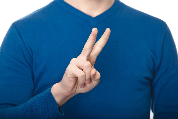 Homem em gesto camisa azul com as mãos no fundo branco — Fotografia de Stock