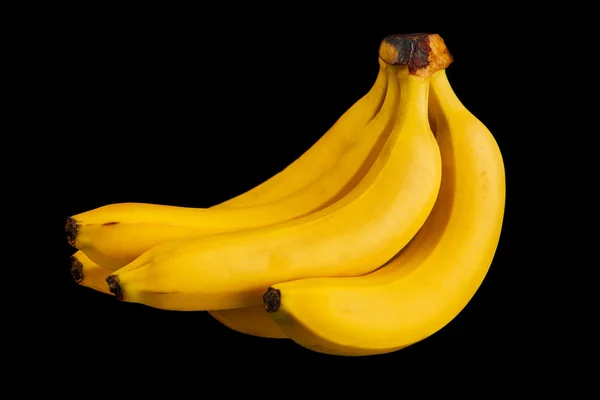 Bunch of yellow ripe bananas isolated on a black background — Stock Photo, Image