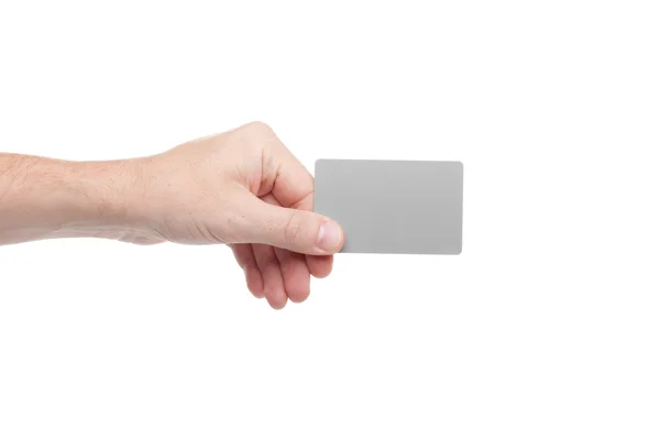 Gray card in a human hand isolated on white background — Stock Photo, Image