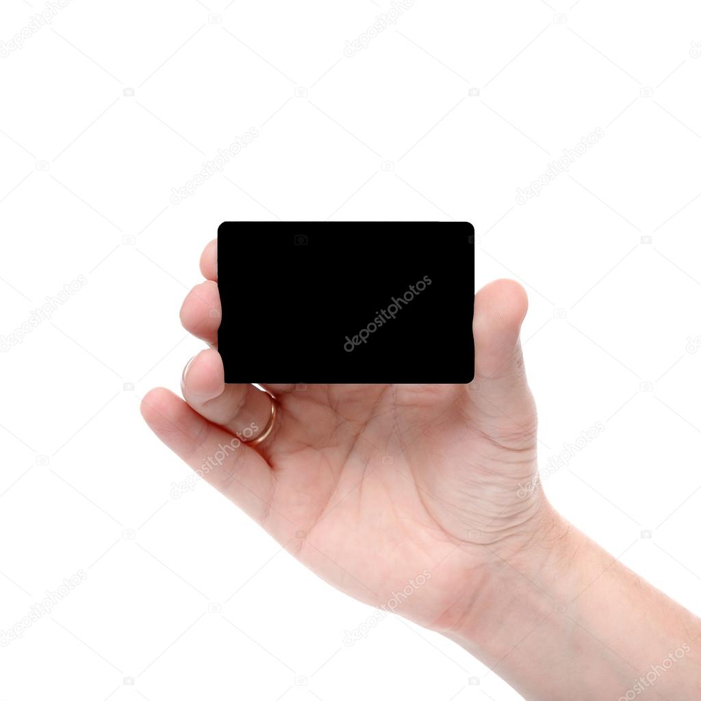 Hand with a black card isolated on white background