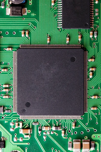 Closeup of electronic circuit board with processor Royalty Free Stock Photos