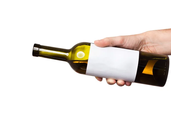 Botella abierta de vino blanco con una etiqueta transparente en la mano aislado —  Fotos de Stock