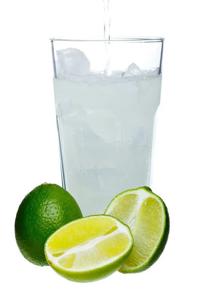 Mojito and limes in a glass on a white background — Stock Photo, Image