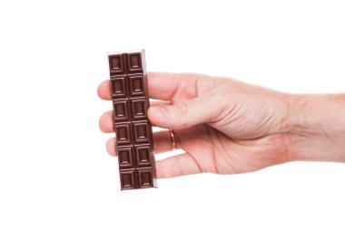 chocolate bar in hand, isolated on a white background