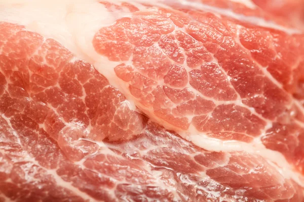 Kawałek świeżego mięsa surowego tło, szczelnie-do góry — Zdjęcie stockowe