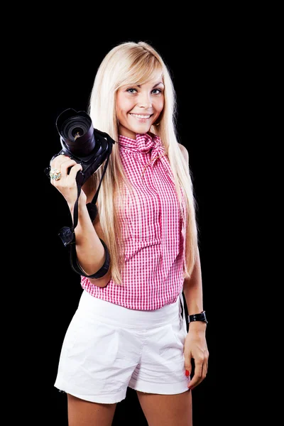 Young beauty woman with photo camera isolated on black backgroun — Stock Photo, Image