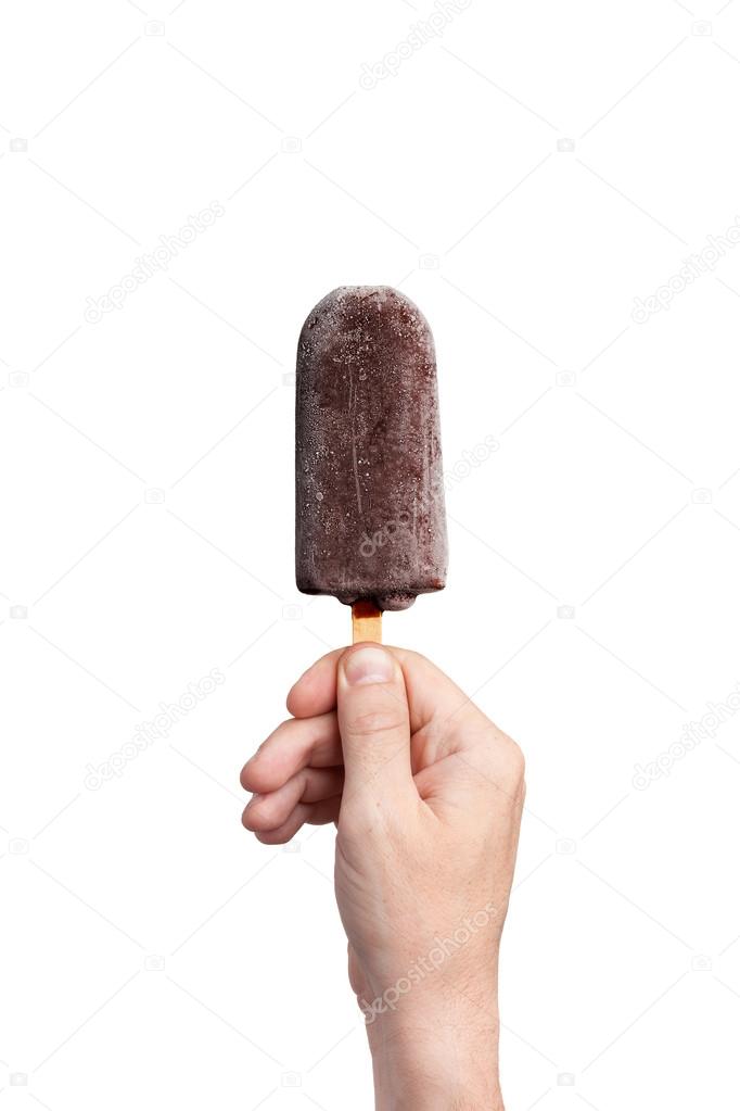 Chocolate ice cream in hand. Isolated on a white background.