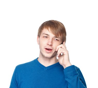 genç adam bir beyaz arka plan bahsediyorsun izole Mavi kazak