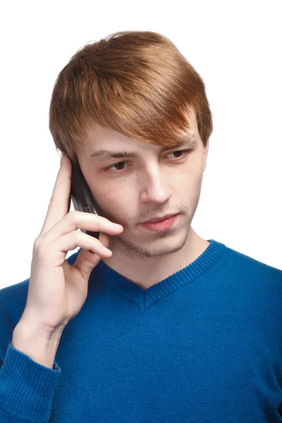 Junger Mann in blauem Pullover isoliert auf weißem Hintergrund — Stockfoto