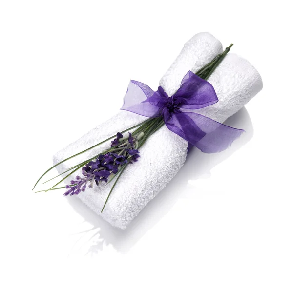 Spa towel with flower and ribbon — Stock Photo, Image