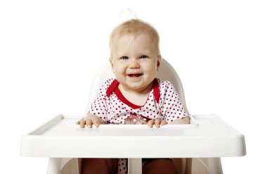 Öğle yemeği için bekliyor bebek