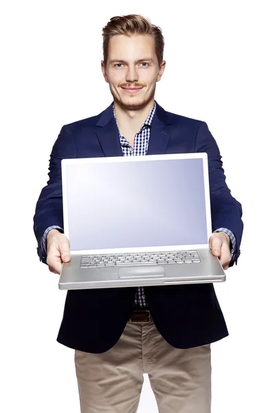 Бизнесмен отдает ноутбук — стоковое фото