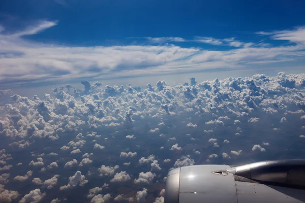 View of a plane wing in flight in clear day — Stock Photo, Image