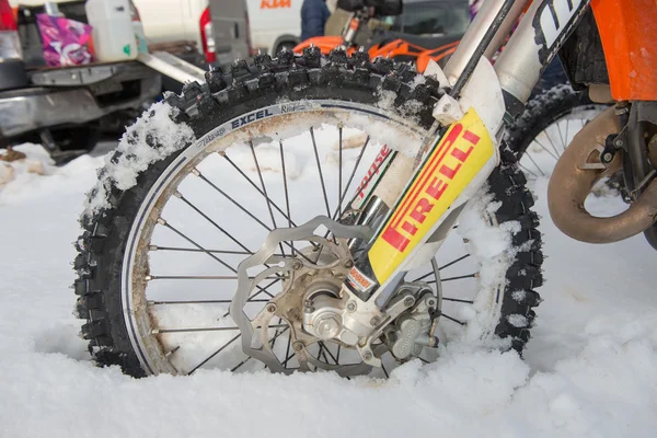 Wheel racing bike in the snow — Stock Photo, Image