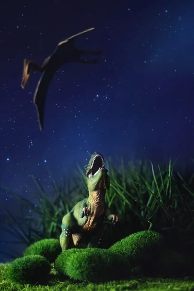 Tyrannosaurus fighting with a prehistoric flying bird — Stock Photo, Image