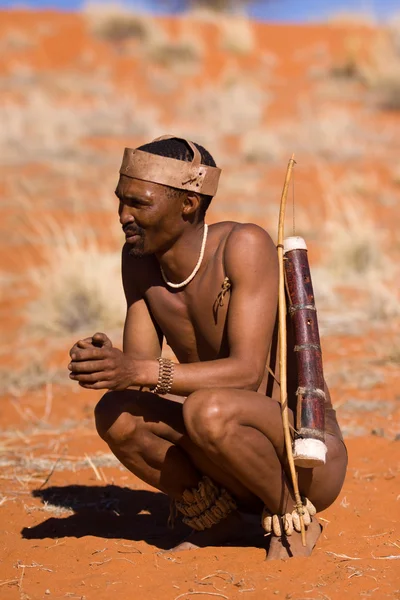 San man in native settlement — Stock Photo, Image