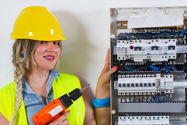 Female Electrician working — Stockfoto