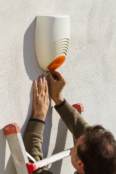 Electrician fixing equipment — Stock Photo, Image