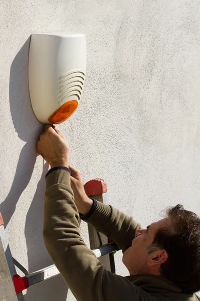 Electrician fixing equipment — Stock Photo, Image