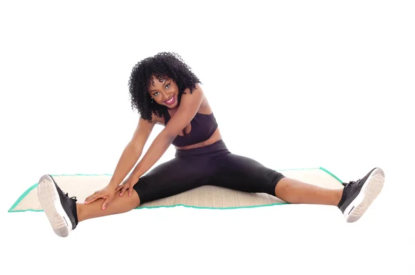Donna afroamericana stretching . — Foto Stock