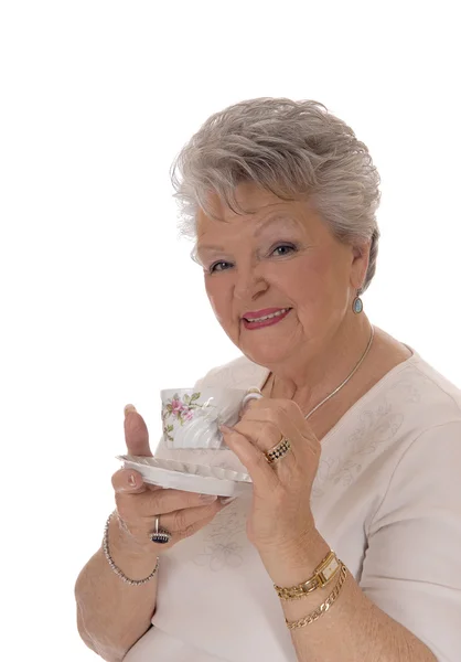 Mujer mayor sosteniendo taza de café . — Foto de Stock