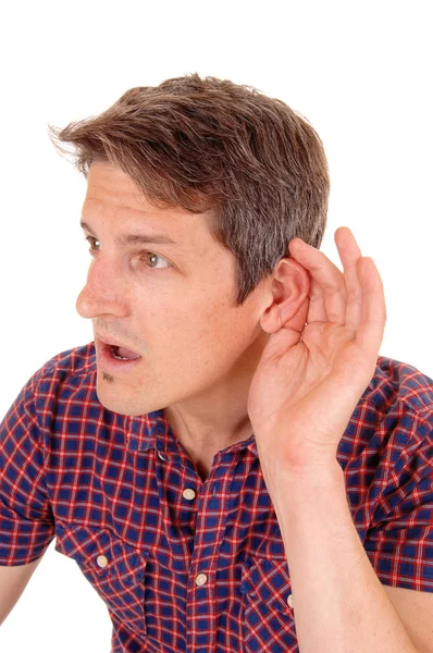Jung man is hard of hearing. — Stock Photo, Image