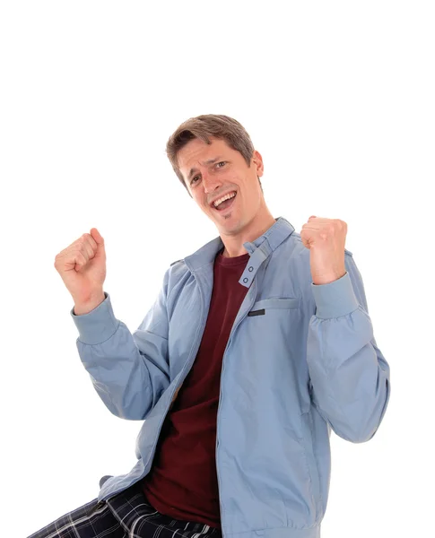 Happy young man with fists up. — Stock Photo, Image