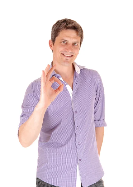 Smiling man giving OK with fingers. — Stock Photo, Image