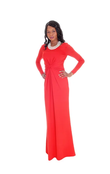 Slim African American woman long red dress. — Stock Photo, Image
