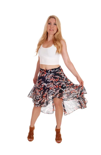 Beautiful girl in a fashion skirt. — Stock Photo, Image