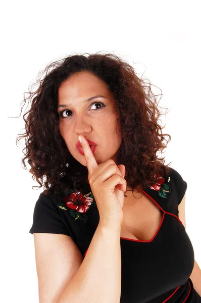Woman whit finger over mouth. — Stock Photo, Image
