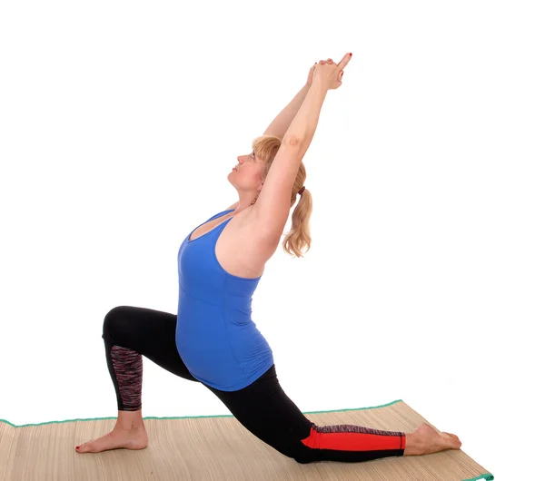 Yoga trainer showing stretching. — Stock Photo, Image