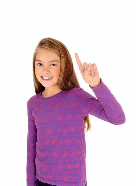 Girl pointing with finger. — Stock Photo, Image