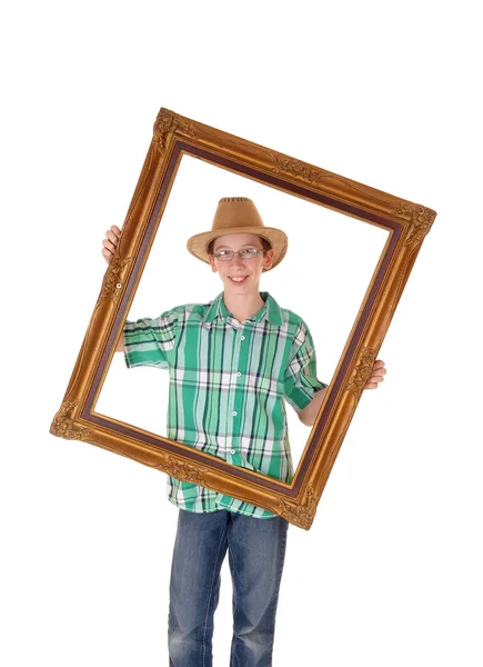 Boy with picture frame. — Stock Photo, Image