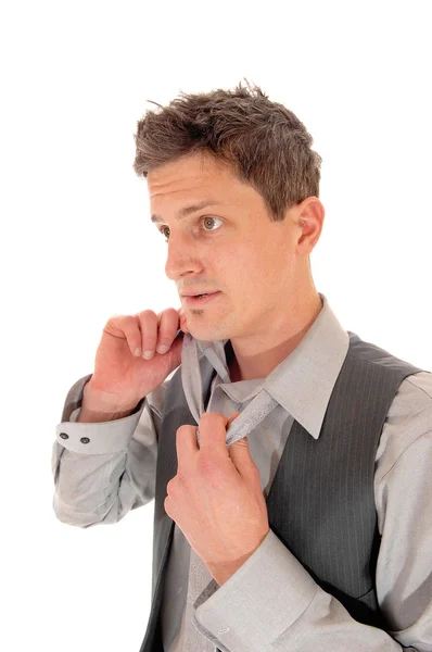 Man taking his tie of. — Stock Photo, Image